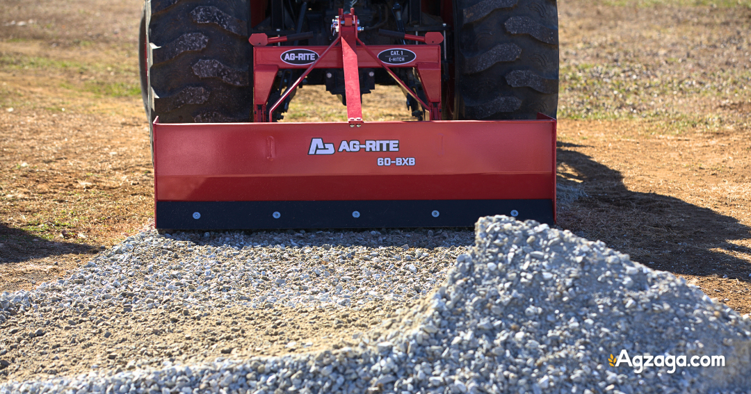 Measuring box blade width next to tractor rear tire width