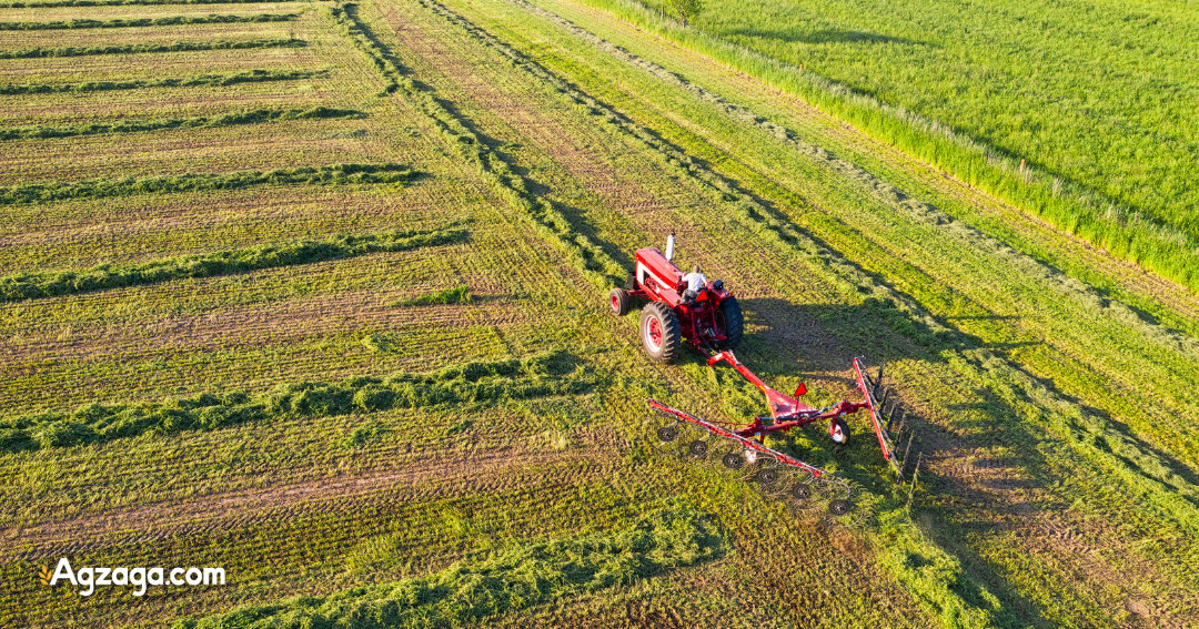 Drone view of raking hay
